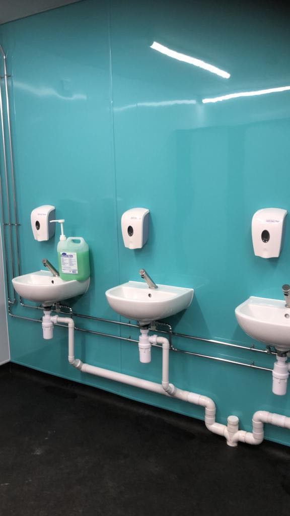 Washroom refurbishment with hygienic wall cladding